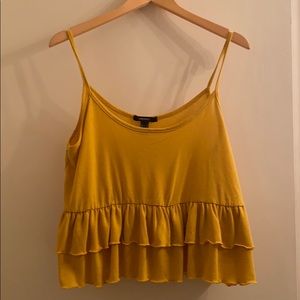 Mustard colored flounce tank